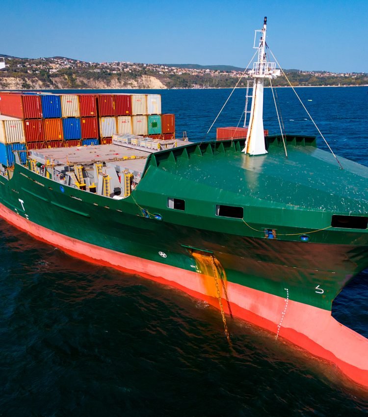 a-container-ship-in-the-sea-aerial-view-2025-03-15-20-52-00-utc